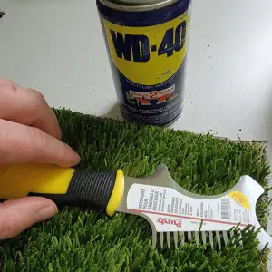 Using WD40 to remove glue from turf