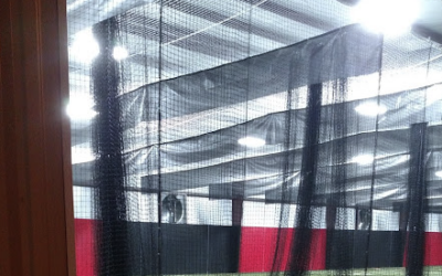 What’s the Deal with the Windscreen Flaps on Top of Cage Divider Nets?